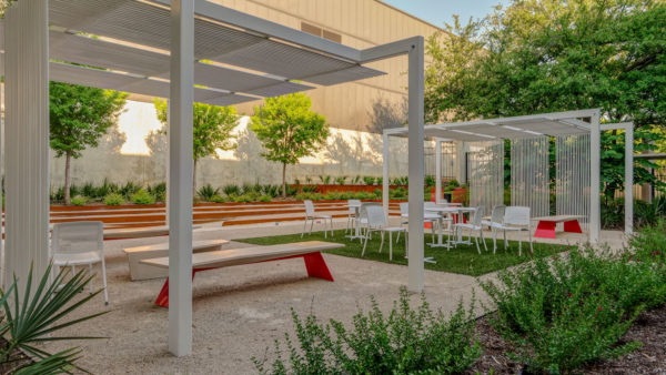 a park with benches, tables, and plants | Southern Botanical