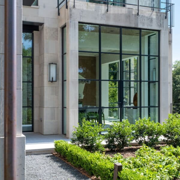 Modern landscaping by Southern Botanical compliments this custom built home in Dallas, Texas